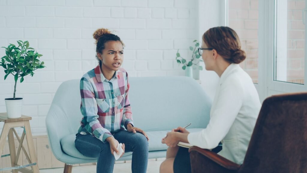 Two people in conversation, listening before answering a hard question